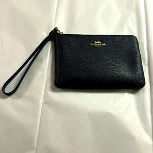 NWT Coach cross grain leather corner zip wristlet.
